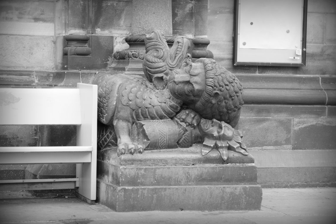 Mythical Lion before the Dom in Bremen: biting the neck of a dragon.