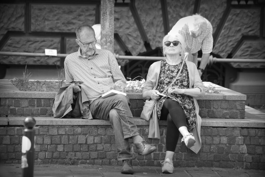 A couple in Bremen, one with a book.