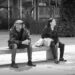 Two people sitting in the sun after the CSD parade in Bremerhaven.