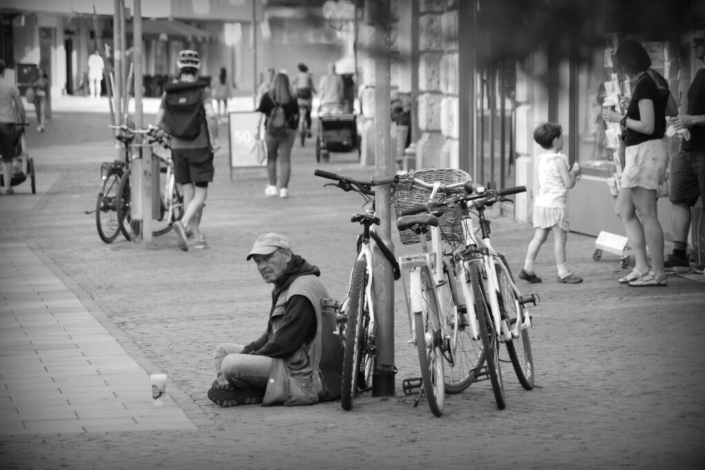 Homeless man begging on the streets of Braunschweig.