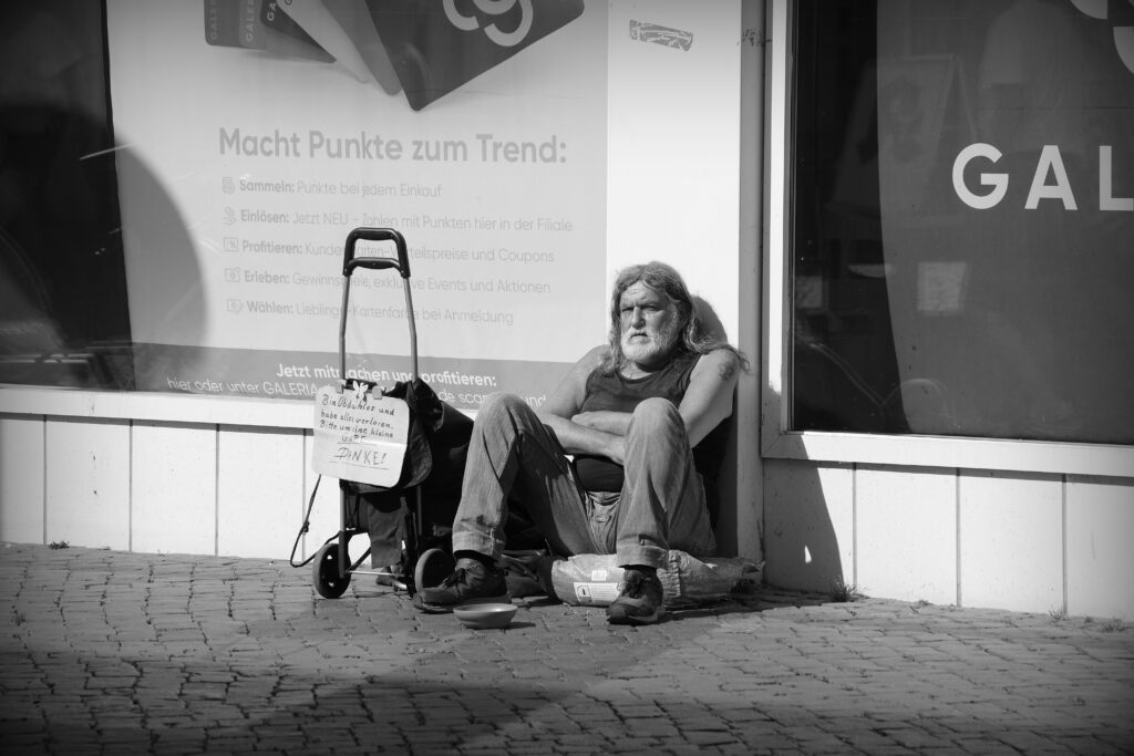 Homeless man begging on the streets of Braunschweig.