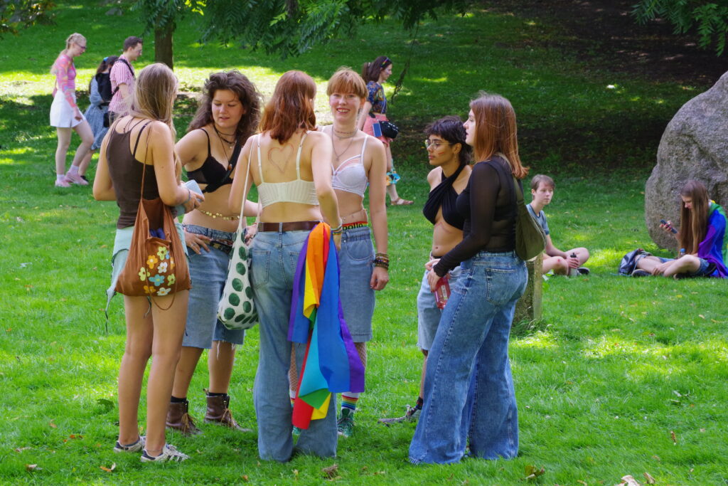 CSD Bremen: A group of people festively attired, waiting for the parade to begin.